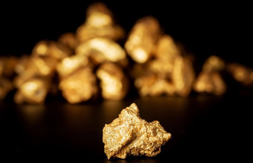 Pile of gold nuggets extracted after drilling results