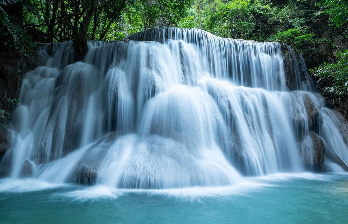 A large waterfall deep within the jungle