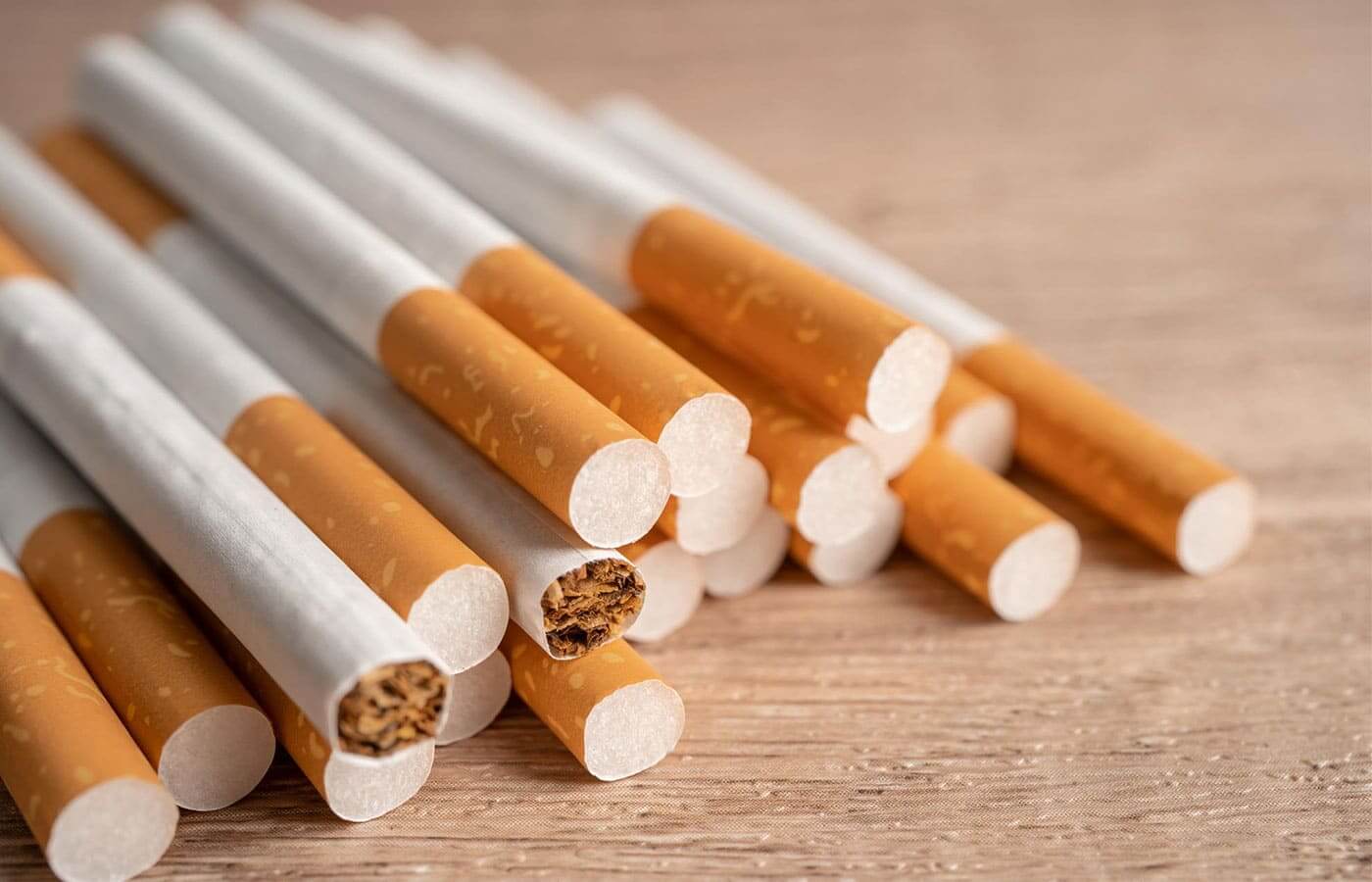 A small pile of cigarettes on a table