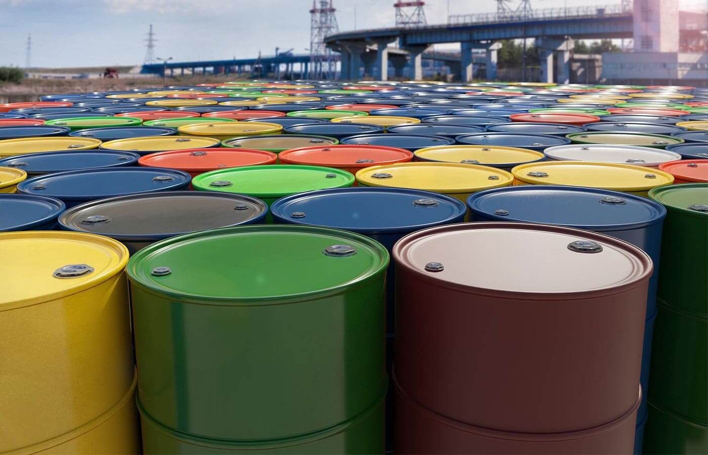 A large collection of oil drums stored at a port