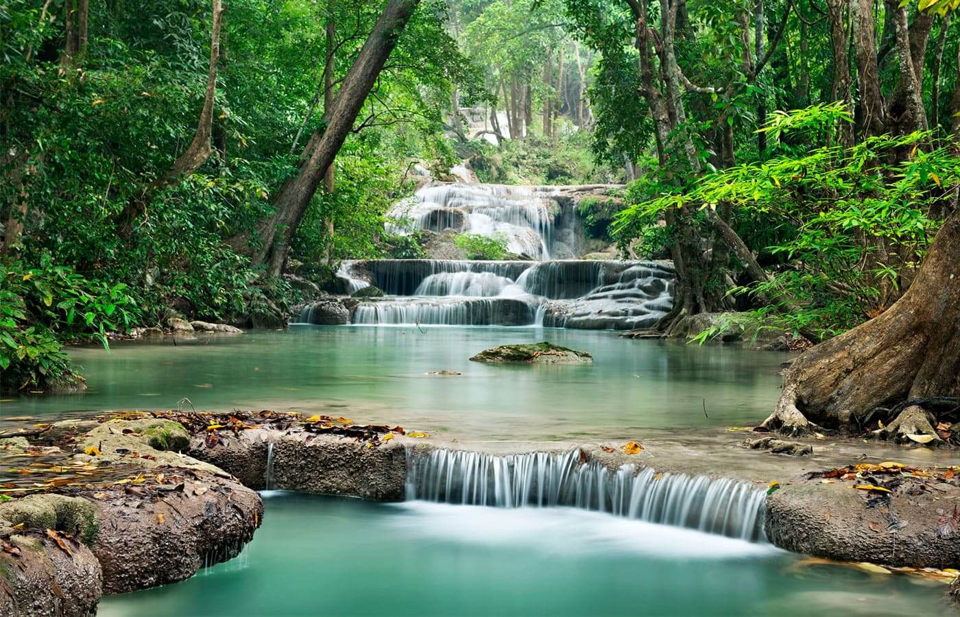 A series of waterfalls in a deep tropical forest