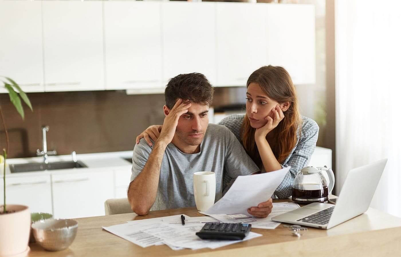 Young couple worried about their investment portfolio